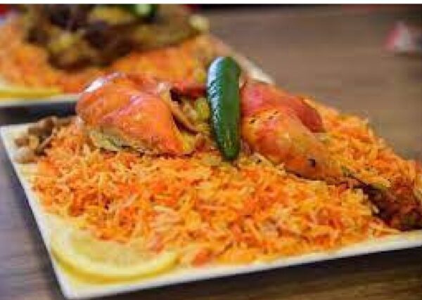 نصف حبة دجاج مع أرز المندي من مطعم الترك